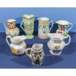 Seven vintage pottery jugs