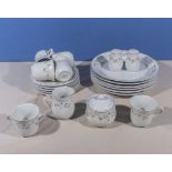 A part teaset and dinner plates