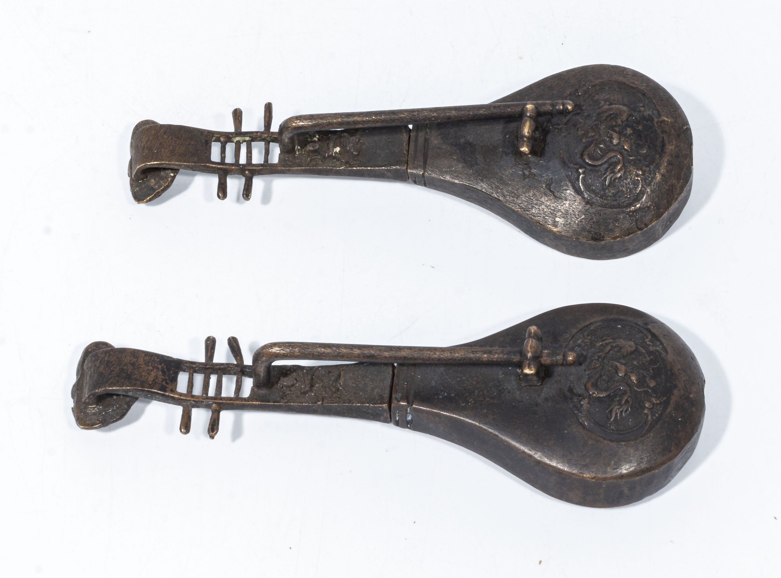 A pair of antique Chinese Qing dynasty bronze cabinet locks in the shape of musical instruments, - Image 2 of 2