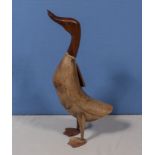 A wooden duck 46cm tall