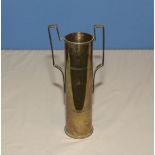 A trench art shell vase, shell measures 25cm