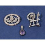 Two silver brooches and a pendant, 19gms