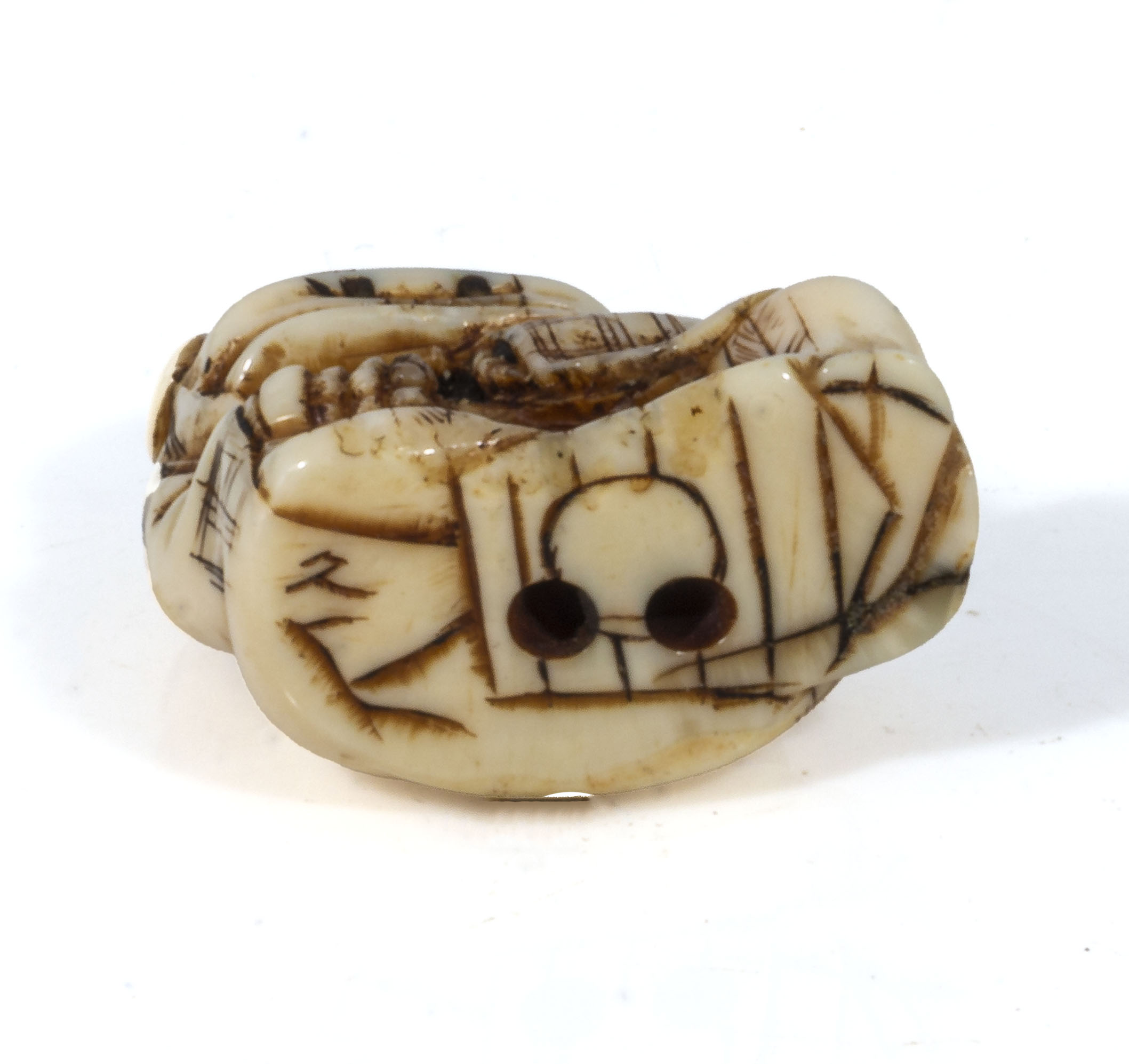 An antique Japanese ivory netsuke meiji period, depicting a boy dressed in a dragon outfit, with - Image 4 of 5