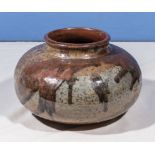 An art pottery squat vase, 15cm tall 22cm dia.
