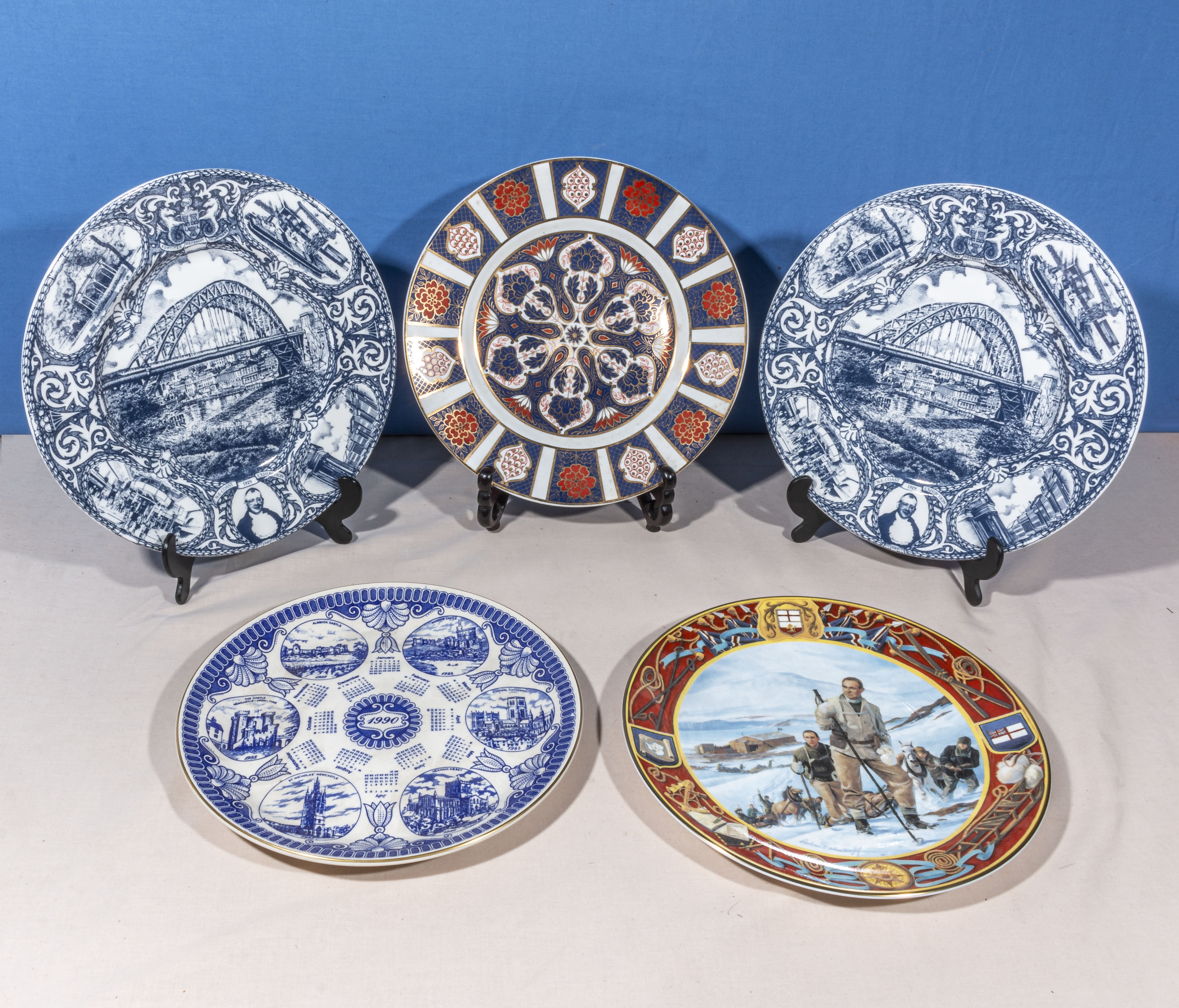 Five decorative plates including two Newcastle Exhibition