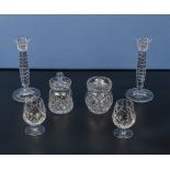 Two crystal brandy glasses, two preserve pots and a pair of candlesticks