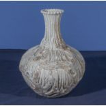 A Chinese antique white glazed vase of unusual form, with a bulbous body and long neck, applied to