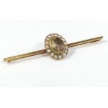 An 18ct gold bar brooch set with a citrine and seed pearls, 5.8gms
