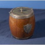 A silver plated wooden biscuit barrel