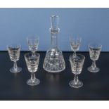 A Waterford crystal wine decanter together with six matching wine glasses