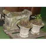 An Early Victorian stone seat and a pair of composite stone urns, stone seat 75cm wide x 50cm