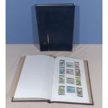 Stamp album containing Tristan da Cunha stamps from 1960 onwards together with a new Prinz stamp