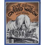 Covered Wagon Roll Along, music by Jimmy Kennedy 1930s.