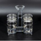 WMF stamped Art Deco double glass pickle jar in typical form of this period. One jar chipped 9" high