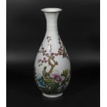 Chinese vase decorated in famille rose coloured enamels depicting birds amongst flowers, with