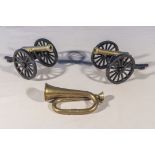 Two small cannons, 20cm long and a miniature bugle 14cm