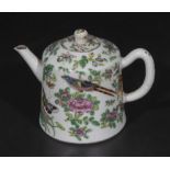 Chinese antique Cantonese small teapot and lid decorated in famile rose coloured enamels depicting