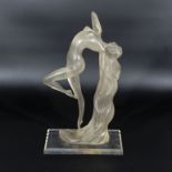 Art Deco style frosted Lucite figure of an exotic dancing girl with long hair 13" high 8" wide.