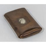 Gentlemans leather cigar case, embossed to the front in silver, initials S.H.
