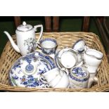 A basket of Pagoda dinner ware, a porcelain coffee service and linen
