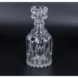 A mallet shaped glass decanter