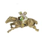 A 9ct gold horse and jockey pendant 8.6gms