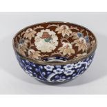 Japanese Imari antique decorated bowl of typical hues, character mark to base, the rim silver