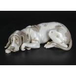 A Lladro figure of a bloodhound, 9.5" in length