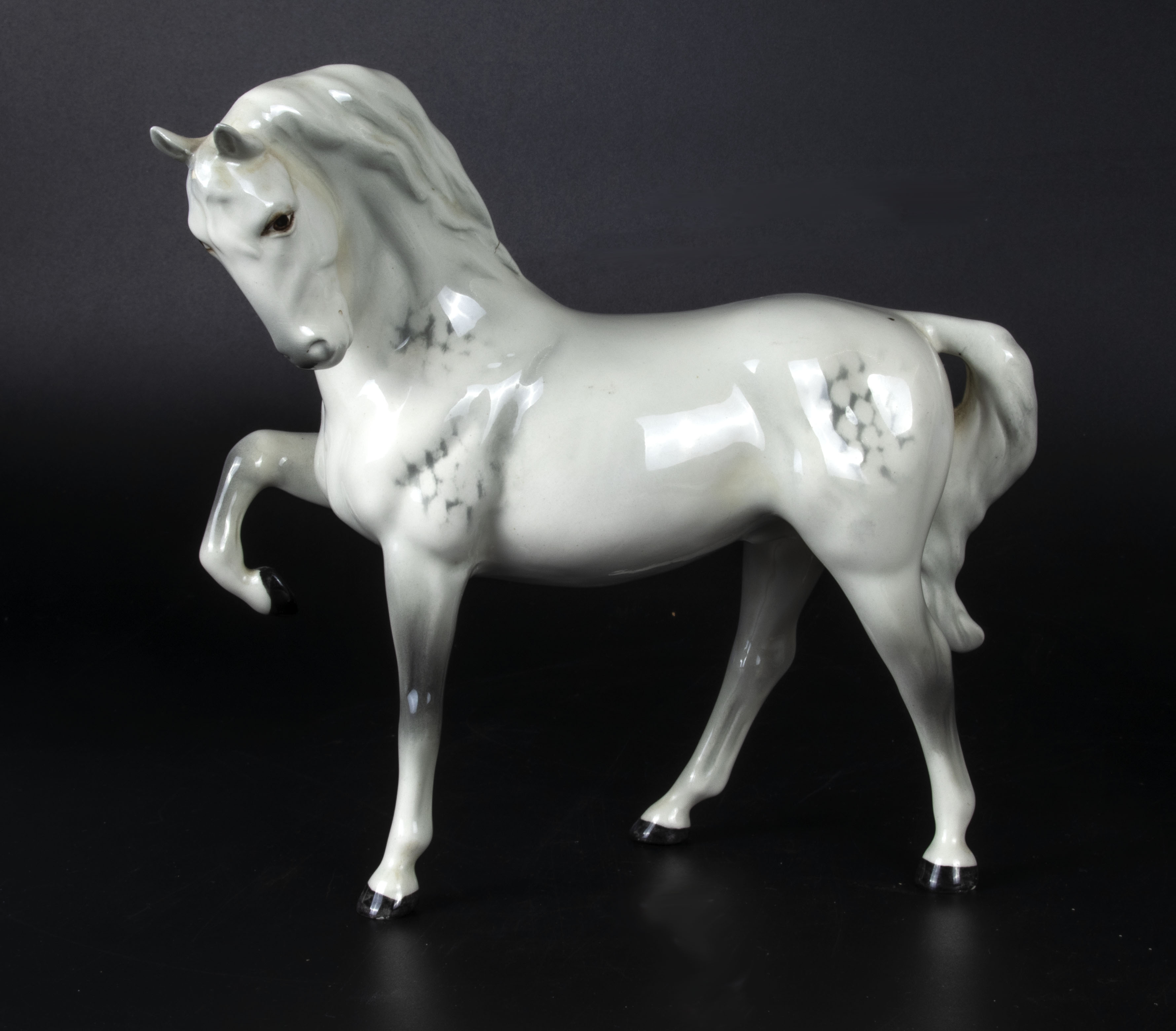 A Beswick horse, (head tucked, leg up) Model No. 1549 second version, grey gloss