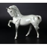 A Beswick horse, (head tucked, leg up) Model No. 1549 second version, grey gloss