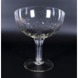 A large hollow stem champagne style glass, 10" tall