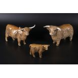 Beswick Highland Bull no. 2008, Highland Cow no. 1740 and Calf no. 1827D all gloss. Cow has broken