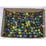 A large bag of hundreds of vintage glass marbles single colours