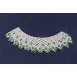 Victorian beadwork collar, finely worked in green and white beads.