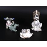 Three pieces of Nao porcelain, A dog 7" tall a duck and a clown