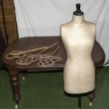 A vintage mannequin/tailors dummy together with 3 carpet beaters