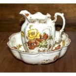 A Victorian jug and bowl with floral design