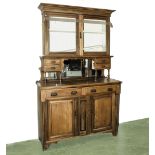 A Victorian oak dresser with two glazed doors to the top, 4'6" wide x 18" deep and 7'3" tall