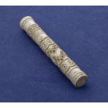 Antique whalebone screw top needle case, carved to the body with a circle design 3.5" in length