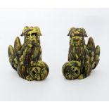 Chinese pair of antique temple dogs with their paws holding a fretted ball, with an unusual splash
