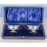 A pair of cased silver salts, retailed by Muirhead and Arthur Glasgow. Marked Birmingham 1907