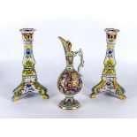 A pair of Italian majolica style candlesticks and an Italian ewer