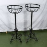Two wrought iron planters