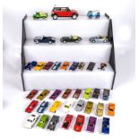 A collection of diecast model cars