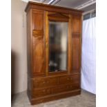 A mahogany single mirrored door wardrobe with drawers. 4'3" wide x 7'10" tall x 22" deep