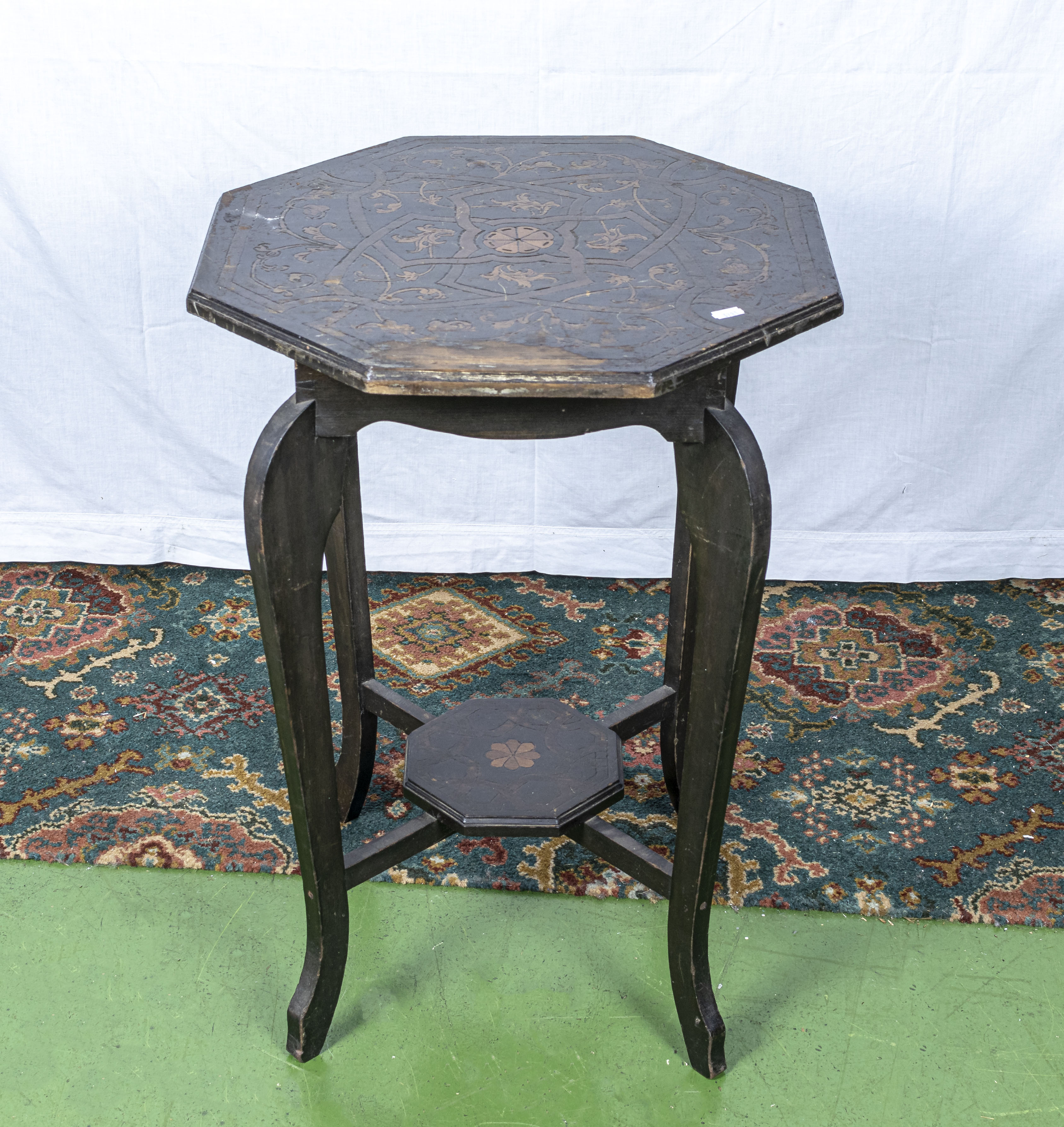 A carved side table