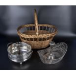 A wicker basket and two silver plated baskets