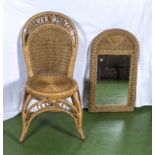 A basketweave chair and mirror