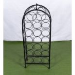 A wrought iron wine rack