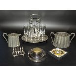 A silver plated stand and six sherry glasses, toast rack and other items